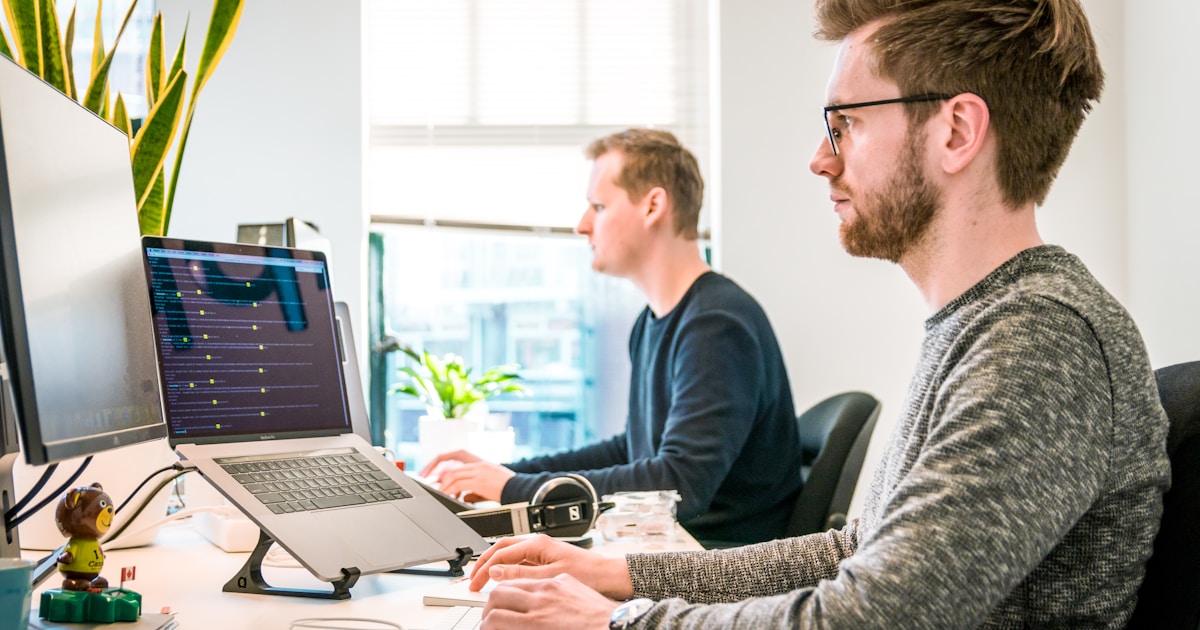 Team monitoring tasks and processes across several screens